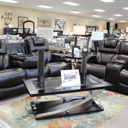 Furniture Queen - Warnerton Adjustable Headrest Power Reclining Sofa Set.