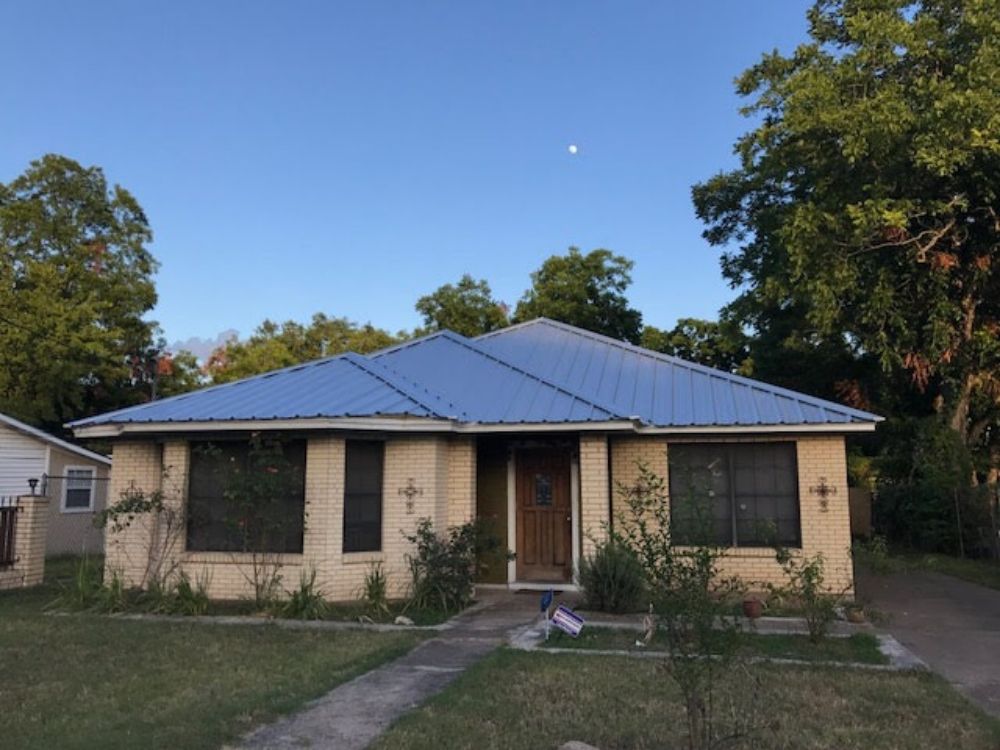 Slide of J & T Roofing Services