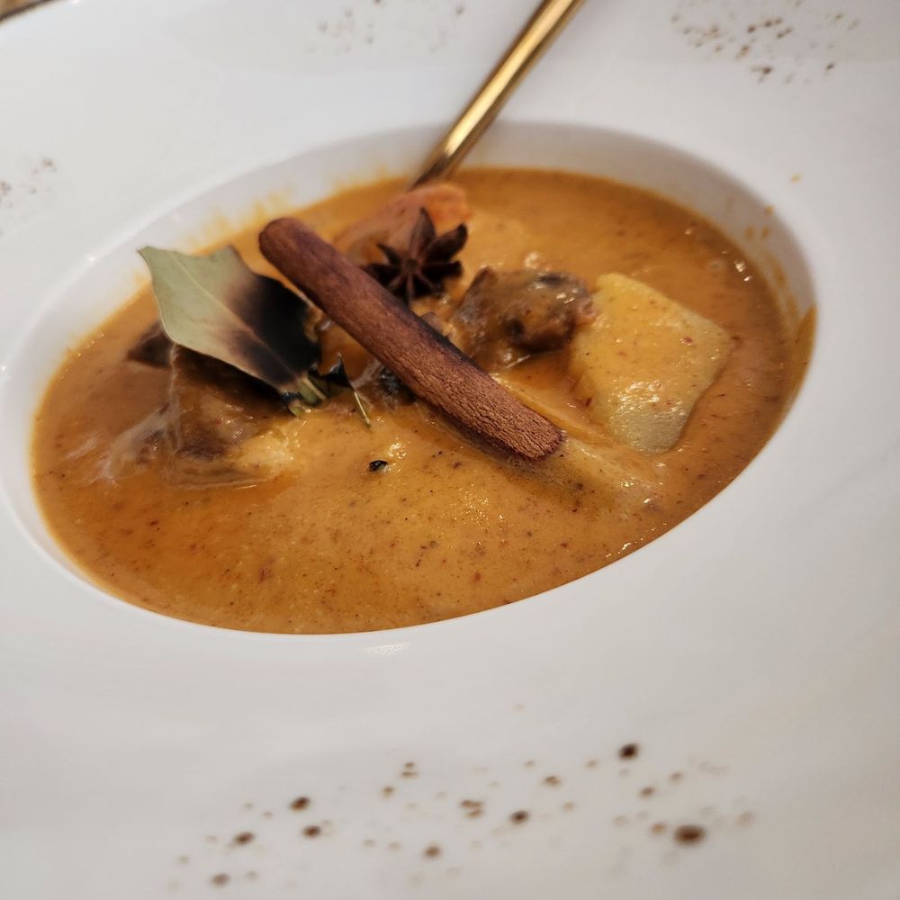 Lamb Curry with smoking cinnamon and bay leaf Lamb Curry with smoking cinnamon and bay leaf