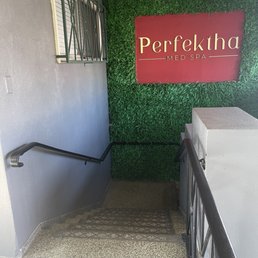 Their sign, hidden away.