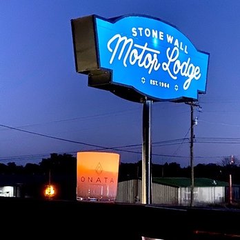 Stonewall Motor Lodge - Rooftop patio. - Hotels Near Me - Stonewall, Texas Stonewall Motor Lodge - Rooftop patio. - Hotels Near Me - Stonewall, Texas