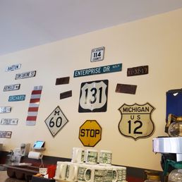 a variety of signs on the wall