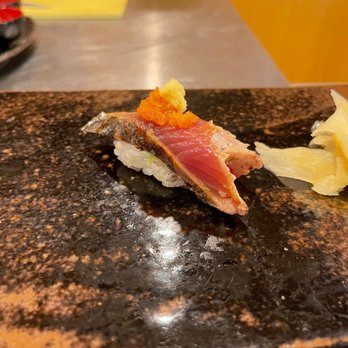 Sushi Uesugi - a piece of sushi on a plate - Sushi Bars Near Me - Brooklyn, New York Sushi Uesugi - a piece of sushi on a plate - Sushi Bars Near Me - Brooklyn, New York