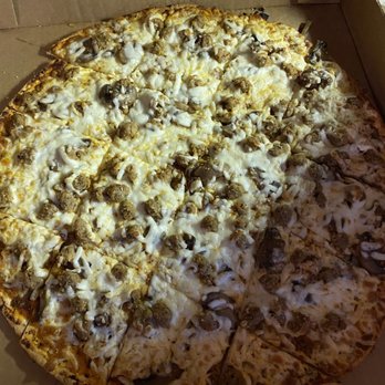 Zio's Pizza - Sausage and mushroom pizza - Pizza Near Me - Kansas City, Missouri Zio's Pizza - Sausage and mushroom pizza - Pizza Near Me - Kansas City, Missouri