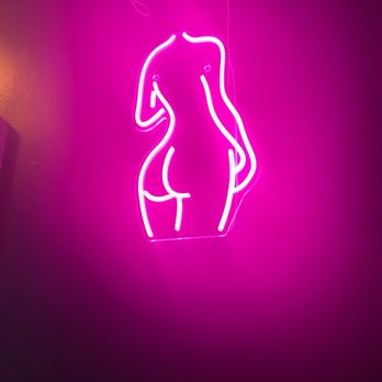 Boxcar Bar - a neon sign of a female figure - Cocktail Bars Near Me - San Antonio, Texas Boxcar Bar - a neon sign of a female figure - Cocktail Bars Near Me - San Antonio, Texas