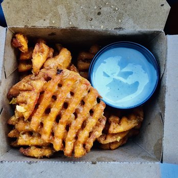 Gold Feather - Sweet potato fries with that heavenly marshmallow sauce . - Beer Bar Near Me - San Antonio, Texas