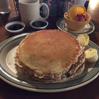 Squeeze In - Large stack of blueberry pancakes & a cup of fresh fruit. - Breakfast & Brunch Near Me - Sparks, Nevada Squeeze In - Large stack of blueberry pancakes & a cup of fresh fruit. - Breakfast & Brunch Near Me - Sparks, Nevada