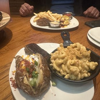 Outback Steakhouse - Center-Cut Sirloin* (6 oz), steakhouse baked potato, steakhouse mac and cheese, sirloin and Alice Springs Chicken® - Steakhouses Near Me - Westbury, New York