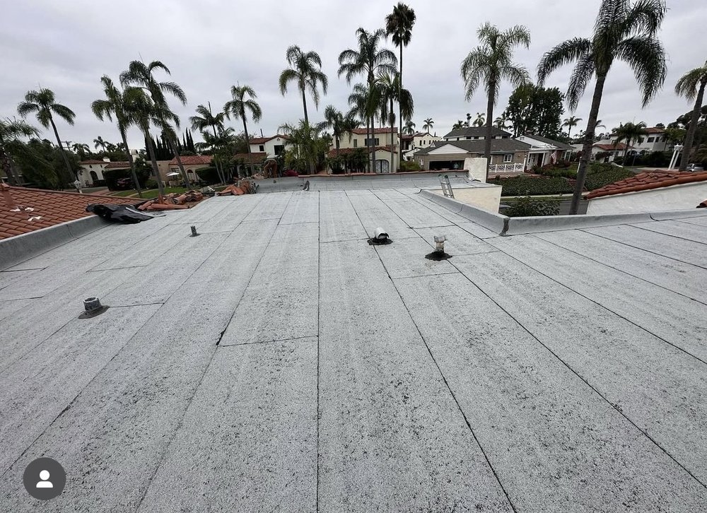 Slide of Exclusively Roofing