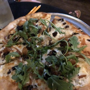 The B.O.B. - Goat cheese and wild mushroom pizza with arugula. - Dance Clubs Near Me - Grand Rapids, Michigan