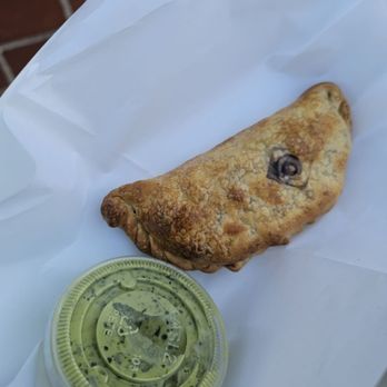 K Bueno - Chicken empanada with garlic cilantro sauce - Cuban Near Me - Chelsea, Michigan K Bueno - Chicken empanada with garlic cilantro sauce - Cuban Near Me - Chelsea, Michigan