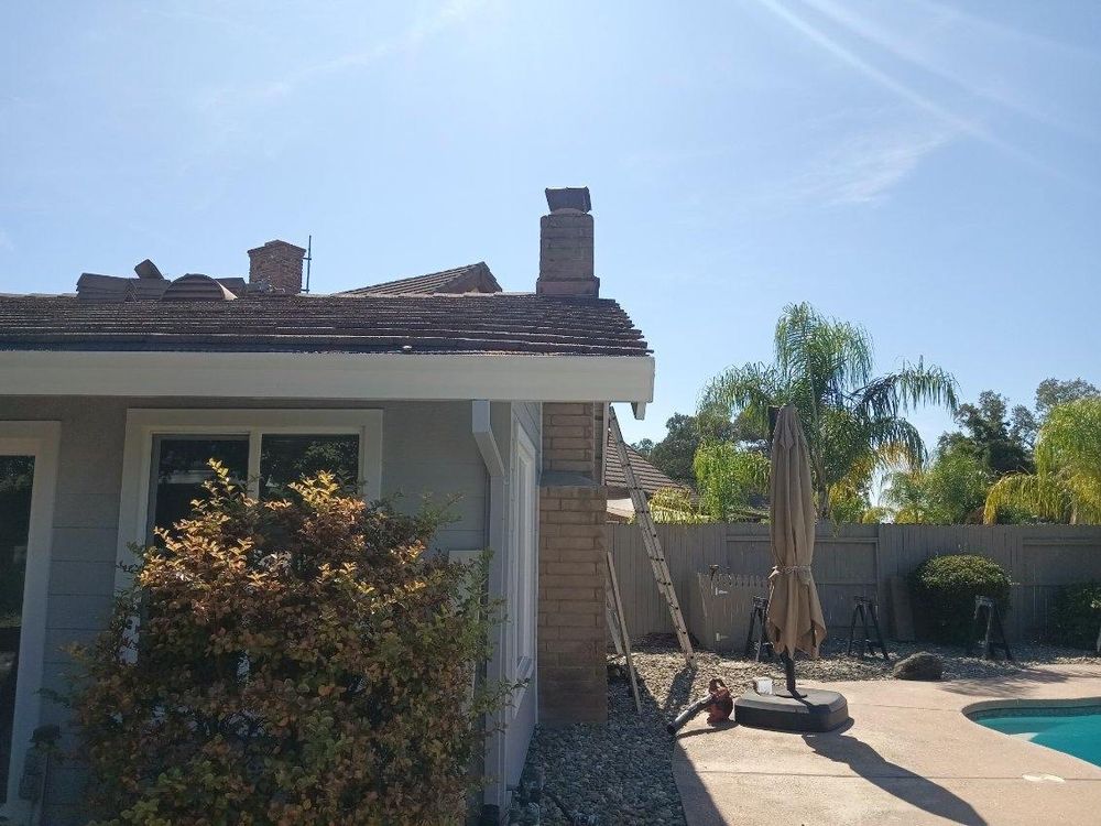 Slide of Quinn Bro's Roofing