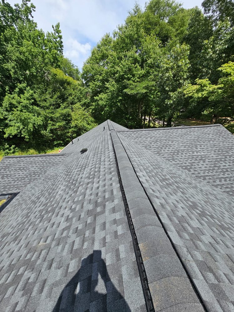 Slide of Twins Roofing & Construction