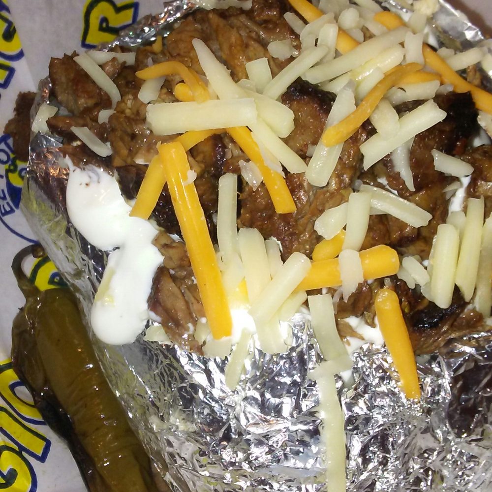 Pollo Regio - Baked photo with carne asada they charge extra for butter. - Mexican Near Me - Dallas, Texas Pollo Regio - Baked photo with carne asada they charge extra for butter. - Mexican Near Me - Dallas, Texas