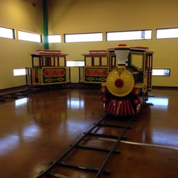 An indoor train ride for children waiting for their appointment An indoor train ride for children waiting for their appointment