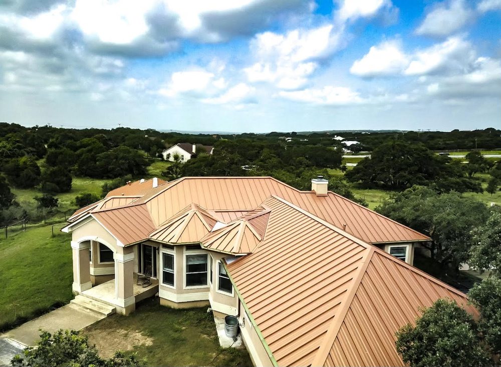 Slide of Tinsley Roofing
