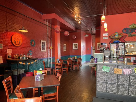 Photo of Las Chicas Taqueria - Owego, NY, US. Seating (booths not pictured here) and cashier