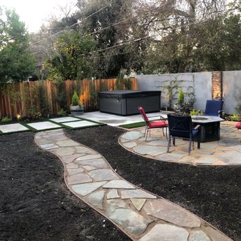 Juan Vazquez Co - New concrete slabs, cedar fence, back wall with stucco and tile accents. - Masonry/Concrete Near Me Juan Vazquez Co - New concrete slabs, cedar fence, back wall with stucco and tile accents. - Masonry/Concrete Near Me