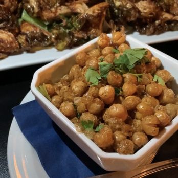 Celtic Cavern - Curry chickpeas (front) and fried Brussel Sprouts (back) - Gastropubs Near Me - Middletown, Connecticut Celtic Cavern - Curry chickpeas (front) and fried Brussel Sprouts (back) - Gastropubs Near Me - Middletown, Connecticut