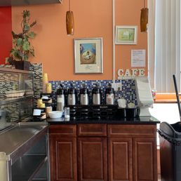 a coffee bar with a variety of coffees