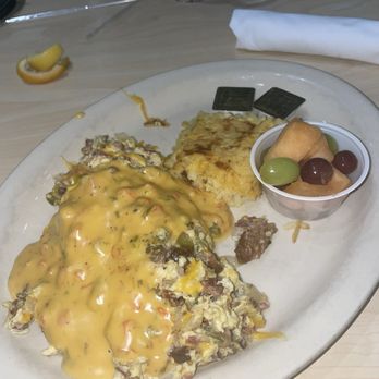 The Toasted Yolk Cafe - Brisket Scramble - Breakfast & Brunch Near Me - Houston, Texas The Toasted Yolk Cafe - Brisket Scramble - Breakfast & Brunch Near Me - Houston, Texas