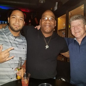Jimmy G's Cigar Bar - three men posing for a picture - Lounges Near Me - Carson City, Nevada