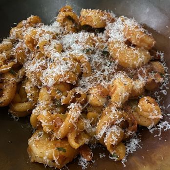 Trattoria by Italian Kitchen - Light cheese dusting on nodi marini fra diavolo - Italian Near Me - Burnaby, British Columbia