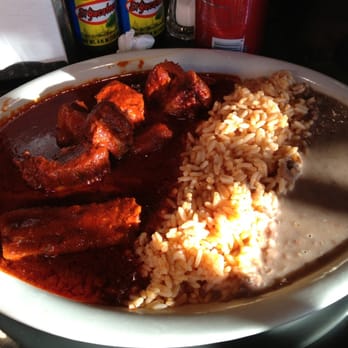 Mi Pueblito - Adobo rojo! Pork ribs in red sauce. Finger licking good ;) - Mexican Near Me - Kearny, New Jersey Mi Pueblito - Adobo rojo! Pork ribs in red sauce. Finger licking good ;) - Mexican Near Me - Kearny, New Jersey