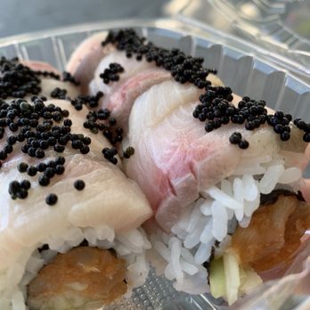 Wasabi Bistro - Raider roll w/ spicy tuna in and yellowtail out. $14 base. Tasty. - Japanese Near Me - Livermore, California Wasabi Bistro - Raider roll w/ spicy tuna in and yellowtail out. $14 base. Tasty. - Japanese Near Me - Livermore, California