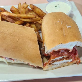 Uncle Louie's Pizza Lounge - Chicken parm sub with fries - Italian Near Me - Wilmington, North Carolina Uncle Louie's Pizza Lounge - Chicken parm sub with fries - Italian Near Me - Wilmington, North Carolina