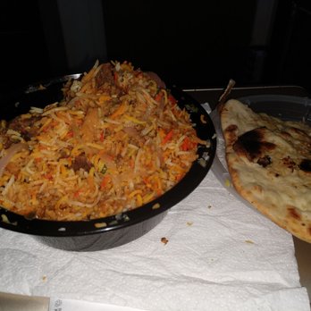 Chandni Chowk - Goat Biryani, and garlic naan. - Indian Near Me - Cary, North Carolina