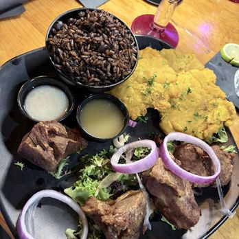 Cubans Be Like Restaurant - Fried pork chunks, tostones, black beans and rice - Cuban Near Me - Fort Myers, Florida Cubans Be Like Restaurant - Fried pork chunks, tostones, black beans and rice - Cuban Near Me - Fort Myers, Florida