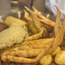 Bag O Crab - Andouille Sausage, cluster of snow crab legs, boiled eggs, side of noodles, corn, and potatoes. It was so good!!!!!!!