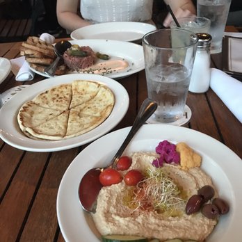 Meddlesome Moth - Hummus plate in the foreground and tartar in the background - Bars Near Me - Dallas, Texas