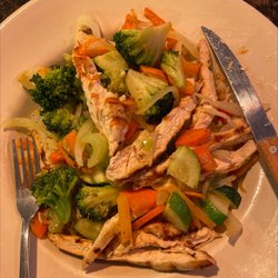 TJ's Food & Spirits - Chicken stir fry with garlic and oil over rice pilaf