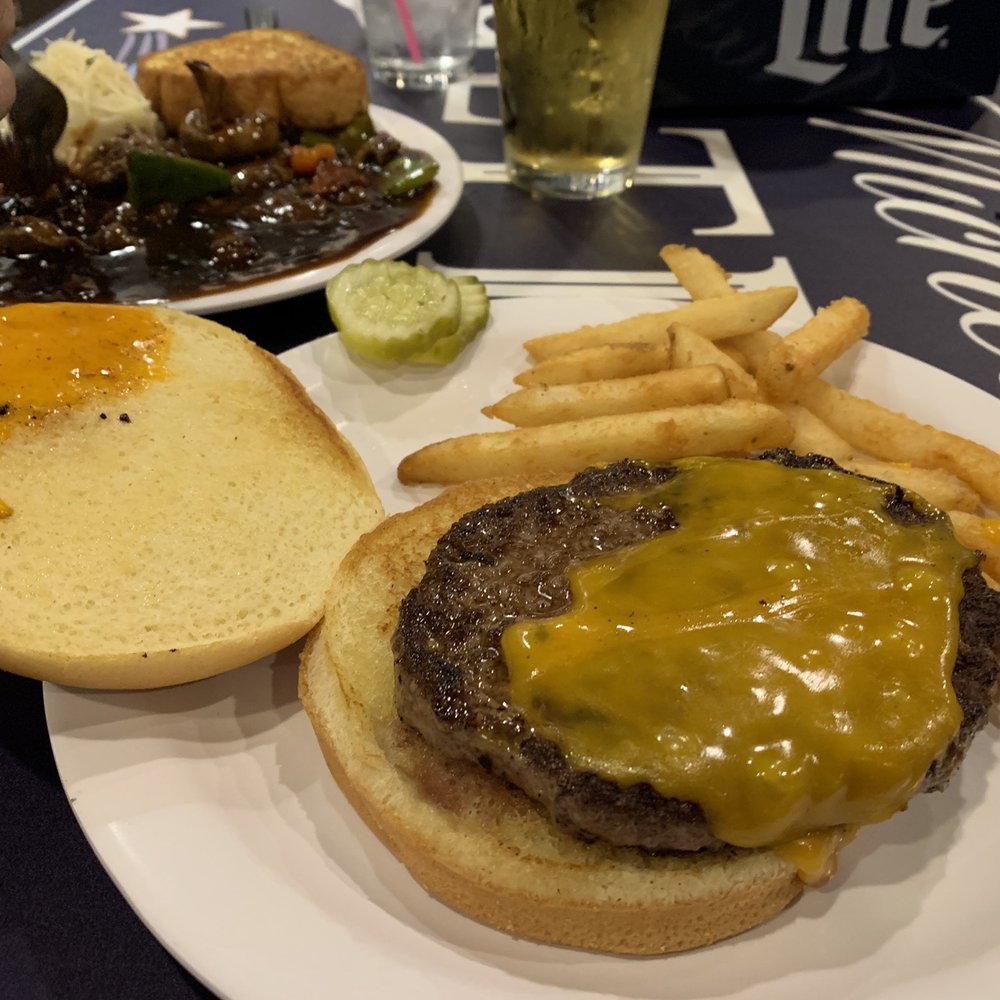 Dreamers Lounge - a cheeseburger and fries on a plate - Lounges Near Me - Grand Forks, North Dakota Dreamers Lounge - a cheeseburger and fries on a plate - Lounges Near Me - Grand Forks, North Dakota