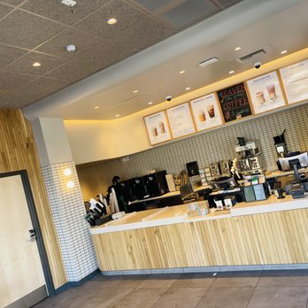 Starbucks - a coffee shop counter with coffee machines - Coffee & Tea Near Me - North Las Vegas, Nevada