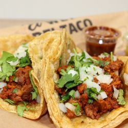 El Wey Del Taco - Tacos al Pastor with marinated pork and fresh toppings at El Wey Del Taco Duluth