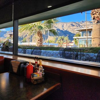 John's Restaurant - Outdoor tables with view - American Near Me - Palm Springs, California John's Restaurant - Outdoor tables with view - American Near Me - Palm Springs, California