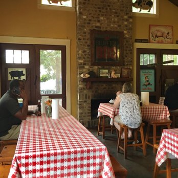Bluffton BBQ - people sitting at tables in a restaurant - Barbeque Near Me - Bluffton, South Carolina