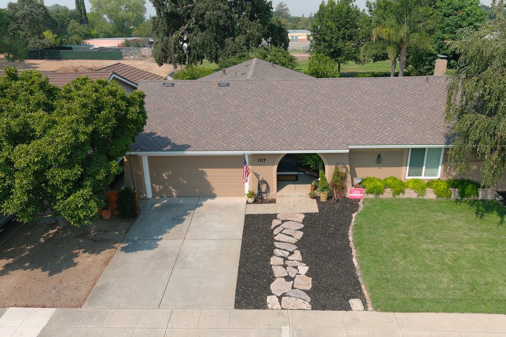 Slide of Sherman Roofing