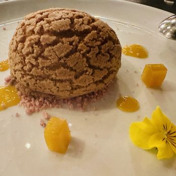 Benchmark - CHURRO CREAM PUFF, vanilla + cinnamon pastry cream, mango coulis - New American Near Me - Santa Ana, California