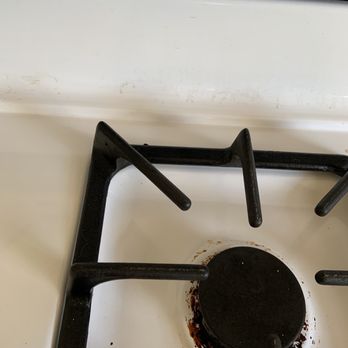 Maidscape - Stove, was not even touched!! This pic doesn't make any justice . But she didn't even bother to touch it. - Home Cleaning Near Me