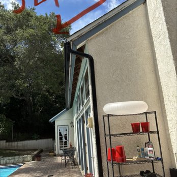 Best Rate Cleaning Services - Photo again showing the slant of the rain gutter so in heavy rain water runs over the gutter causing a waterfall. - Pressure Washers Near Me Best Rate Cleaning Services - Photo again showing the slant of the rain gutter so in heavy rain water runs over the gutter causing a waterfall. - Pressure Washers Near Me