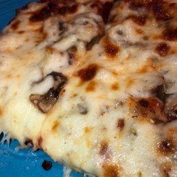 a slice of pizza on a blue plate