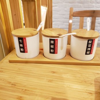 Kyuramen - Flushing - Magnify the picture these are the 3 condiments labeled - Ramen Near Me - Flushing, New York Kyuramen - Flushing - Magnify the picture these are the 3 condiments labeled - Ramen Near Me - Flushing, New York