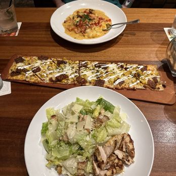 Seasons 52 - Wood-Grilled Corn, Aged Cheddar And Spiced Bacon (Middle) Romaine Caesar w Chicken (Front) Wood-Grilled Shrimp And Grits (Back,) - New American Near Me - Plano, Texas