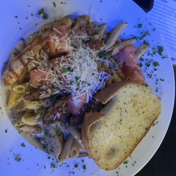 Four Corners - Cajun penne pasta with blackened chicken - Sports Bars Near Me - Chapel Hill, North Carolina