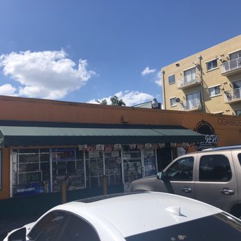 Guerrero Supermarket - cars parked in front of the store - Grocery Near Me - Miami, Florida