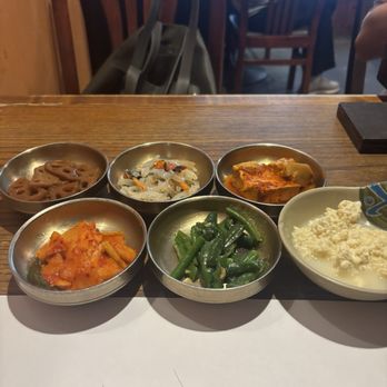 Cho Dang Gol - Banchans: lotus root, acorn jelly, spicy tofu, spicy daikon, green beans, and homemade tofu. - Korean Near Me - New York, New York